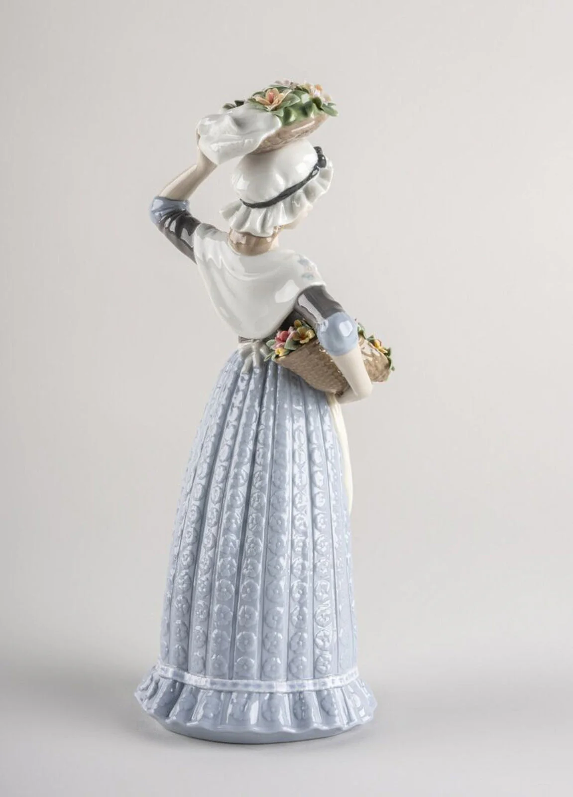 Lladro Flower Picking Woman Figurine - Image 3